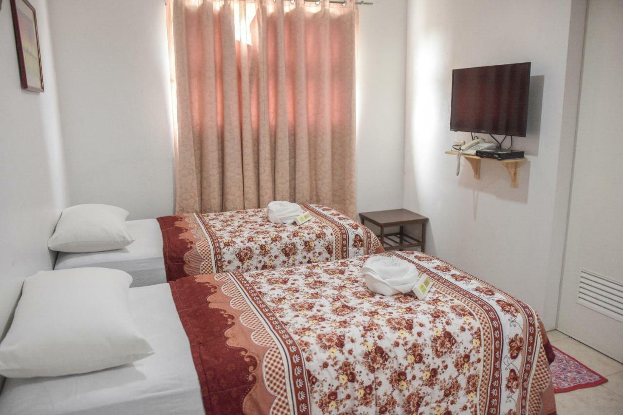 Tiptop Tower Suite Inn Dumaguete City Esterno foto