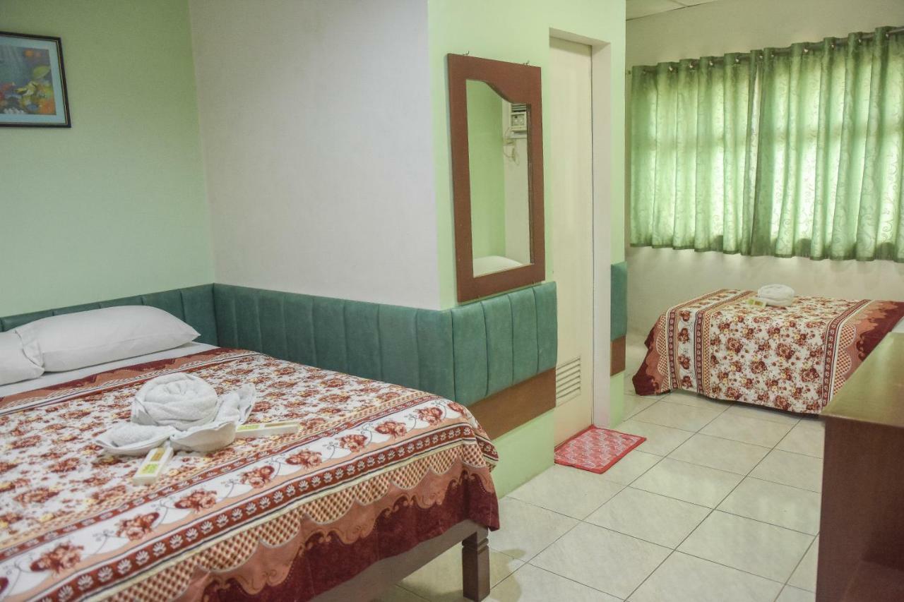 Tiptop Tower Suite Inn Dumaguete City Esterno foto