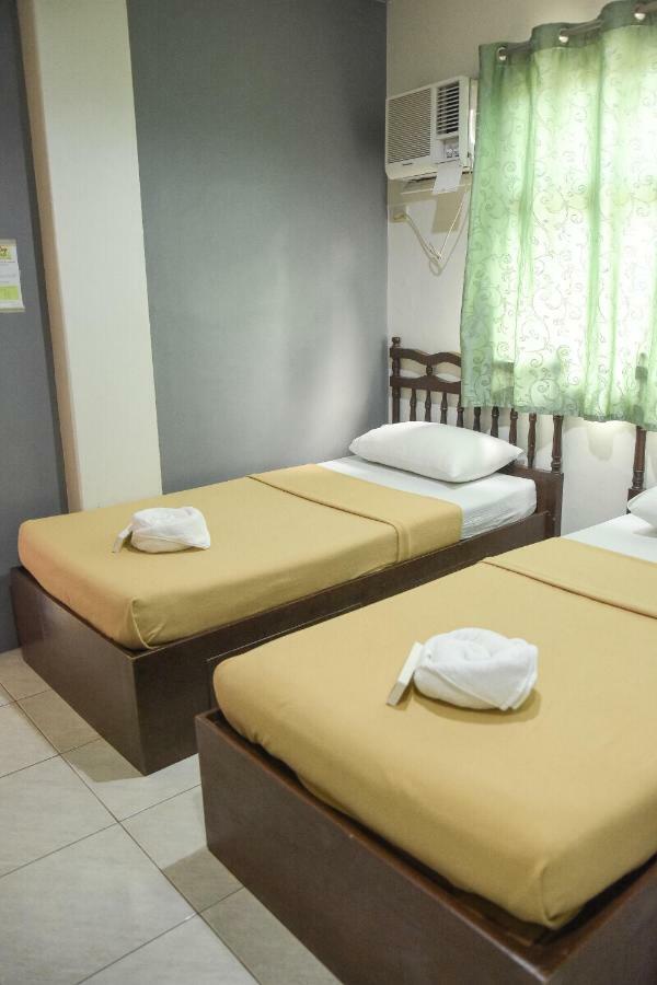 Tiptop Tower Suite Inn Dumaguete City Camera foto